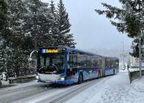 Engadin Bus, St.Moritz. MAN Lion’s City 18 Hybrid (GR 156’993) in Champfèr, Schulhaus. (29.12.2021)