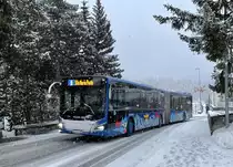 Engadin Bus, St.Moritz. MAN Lion’s City 18 Hybrid (GR 156’993) in Champfèr, Schulhaus. (29.12.2021)