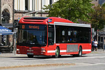 MAN Lions City 4814, auf der Linie 61, fährt durch die Odengatan. Die Aufnahme stammt vom 05.06.2022.