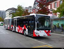 Postauto - Mercedes Citaro JU 35970 Unterwegs in Delémont am 29.09.2022