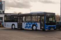 Prü-A 950, MAN lion’s City, des Bauunternehmens Gebr. André aus Prüm, gesehen auf einem Parkplatz in Marnach. 01.2023  