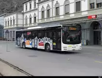Postauto / Ortsbus Brig/Glis - MAN Lion`s City  VS  449119 vor dem SBB Bhf. Brig am 26.02.2023