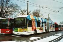 TPF Fribourg Nr. 516/FR 300'396 MAN/Hess Gelenkduobus am 14. Februar 2009 Fribourg, Garage (mit Vollwerbung fr das  Avry Centre )