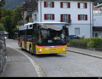 Postauto - MAN Lion`s City  OW 10002 in den Strassen von Alpnach am 21.09.2023