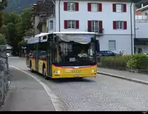 Postauto - MAN Lion`s City  OW 10002 in den Strassen von Alpnach am 21.09.2023