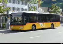 Postauto - Mercedes Citaro  NW 5165 bei den Haltestellen bei dem Bhf. Stans am 21.09.2023