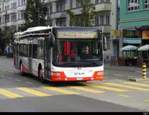 asm Seeland - MAN Lion`s City  Nr.60 unterwegs auf der Linie 75 in Biel am 30.09.2023