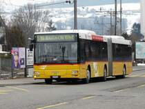 Postauto - MAN Gelenkbus ZH 587799 unterweg auf der Linie 530 in B�lach am 20.02.2009