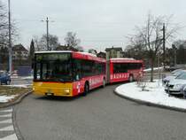 Postauto - MAN Gelenkbus ZH 780685 unterweg auf der Linie 530 in B�lach am 20.02.2009