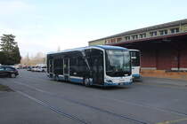 VBZ Nr. 657 (MAN New Lion's City 12E) am 7.2.2024 beim Bhf. Wollishofen