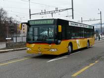 Postauto - Mercedes Citaro ZH 401766 unterwegs auf der Linie 525 in Blach am  20.02.2009 .. Der Bus ist mit einem Kleinen Wappen von Oberglatt unterwegs auf der Front .. 