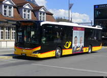 Postauto - MAN Lion`s City Hybrid  BE 653386 vor dem Bahnhof Interlaken Ost am 05.04.2025