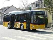 Postauto - MAN AG 17943 bei der Haltestelle vor dem Bahnhof in Koblenz am 09.04.2009