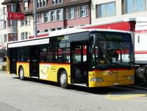 Postauto - Mercedes Citaro  AG 8965 unterwegs auf der Linie 371 bei den Postautohaltestellen vor dem Bahnhof Brugg am 09.04.2009