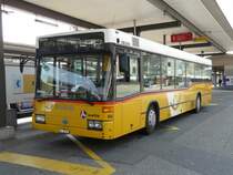 Postauto - Mercedes O 405N  Nr.86 *(SAURER) AG 18562 bei den Postautohaltestellen vor dem Bahnhof Brugg am 09.04.2009  * Kein Mercedes Stern auf der Front daf�r ein altes Saurer Logo ;-)