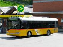 Postauto - Solaris  BE 601265 unterwegs auf der Linie 451 bei der postautohaltestelle beim Bahnhof von Bolligen am 01.05.2009