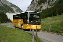 Nur drei Mal tglich fhrt im Sommer das PostAuto von Vttis zum Staudamm Gigerwald. Das Bild zeigt den Neoplan 313 SG1595 von PU Gessinger, Bad Ragaz, auf dem Rckweg von der morgendlichen Bergfahrt nach Vttis. Aufnahme vom 26.5.2007. 