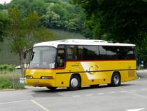 Postauto - Neoplan Bus TI 162649 bei der Haltestelle beim Bahnhof Magliaso am 