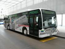 TPL - Mercedes Citaro Nr.317  TI 309520 mit Werbung abgestellt bei der Haltestelle im Zentrum in der Stadt Lugano am 13.05.2009