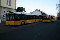PostAuto Z�rich Garage Embrach Nr. 38 und 37 (Heute Nr. 193 und 192, MAN N�313/A20, 2005) am 29.12.2007 in Embrach-Rorbas, Bahnhof.
