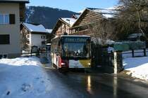 PU Stuppan, Flims, GR 161'644 (MAN Lion's City A35, 2006) am 20.1.2008 unterwegs im Dorf Falera. 