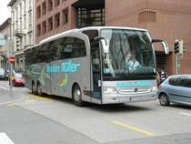 Mercedes TRAVEGO HP:M 1480 unterwes in der Stadt Lugano am 13.05.2009