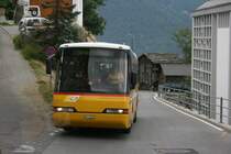 PU Karlen, Stalden, VS 34'455 (Neoplan N314�, 1999) am 13.7.2009 bei der Post T�rbel. 