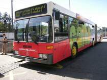 O405GN 90 am Bahnhof Liestal (neue Vollwerbung Gardarena)