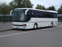 Linie115 von Tessin Richtung Rostock Hauptbahnhof/Sd steht am ZOB in Hhe Rostock Hbf.(23.09.09)