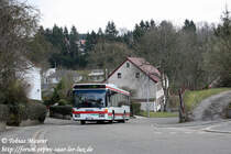 30.03.2009: Der NK-S 21 erklimmt den aufstieg aus dem Leopoldsthal in Schiffweiler. Der O 405 N� geh�rt zum Fuhrpark der GRS Verkehrsdienste und wird im Auftrag der RSW auf der Linie 353 nach Illingen eingesetzt. Der Wagen stammt im �brigen von der RSW und wurde als Reservefahrzeug beschafft.