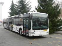 Postauto - Mercedes Citaro  AG 138727 bei der Haltestelle vor der Post in Bremgarten/AG am 20.11.2009
