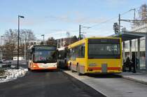 RBS, Worblaufen Nrn. 19/BE 666'119 MAN und 19/BE 464'419 MAN am 3. Dezember 2009 beim Bahnhof Bolligen.