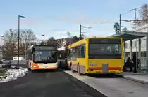 RBS, Worblaufen Nrn. 19/BE 666'119 MAN und 19/BE 464'419 MAN am 3. Dezember 2009 beim Bahnhof Bolligen.
