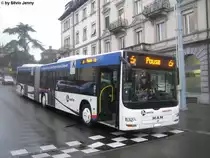 Postauto/BDWM (PU Wicki) AG 438 038 (MAN Lion's City GL) am 1.12.09 in der Ulmbergstrasse, vis-a-vis des Bhf. Z�rich Enge. Die Postautos der Linie 444 (Bremgarten - (�etlibergtunnel) - Z�rich Enge) haben beim Bhf. Enge eine l�ngere Pause. Die sie aus Platzgr�nden in der Ulmbergstrasse verbringen. Da die Wicki-Postautos nicht am ZVV-Leitsystem angeschlossen sind, erscheint auf der LED-Anzeige, wenn Pause steht jeweils auch noch 2 Kaffeetassen, was im ZVV leider nicht der Fall ist.