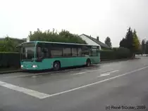 Mercedes O530 von Ossenbach autobusse an der Haltestelle Hufer weg am 10.11.09. Es handelt sich um GL-KL 60 aus dem Jahre 1998 der 2007 aus der Schweiz an den Ossenbach �berging