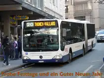 TPG - Mercedes Citaro Nr.129 GE 960513 unterwegs auf der Linie 20 in der Stadt Genf am 11.12.2009