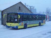 Conecto Nr 311 im Schneeschauer vor dem Bahnhof Donaueschingen am 02/01/2010.