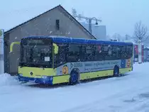 Conecto Nr 311 im Schneeschauer vor dem Bahnhof Donaueschingen am 02/01/2010.