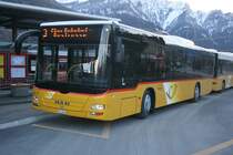 PU Dnser, Trimmis, GR 24'206 (MAN Lion's City A21, 2009) am 28.12.2009 beim Bahnhof Untervaz-Trimmis.