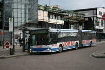 WSW 0176 (W SW 820) mit Werbung fr Heizl Vorst am 27.12.2009 vor dem Bf Wuppertal Oberbarmen.