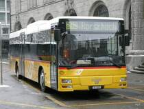 Postauto - MAN SG 2205 unterwegs auf der Linie 242 bei den Postautohaltestellen vor dem Bahnhof St.Gallen am 10.01.2010