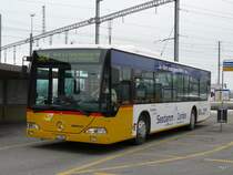 Postauto - Mercedes Citaro SZ 58004 unterwegs auf der Linie 524 bei den Bushaltestellen beim Bahnhof Pf�ffikon/SZ am 16.01.2010