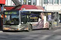 MAN  Flughafen-Zubringer-Bus  - Bonn - Flughafen K�ln/Bonn - am Hbf Bonn, 26.12.2009. Mit einer Werbeaufklebung, die echten  Tarnkarakter  hat !!