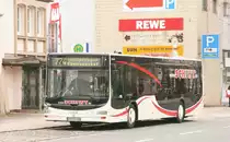 Schiwy Reisen 9128 (EN EU 100) mit der Linie 774 am Kettwiger Markt,8.2.2010. 