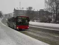 MAN NL 263 (Wagennummer 7412, Kfz-Kennzeichen D-GJ 7412, Baujahr 2004) der Rheinbahn AG Düsseldorf. Aufgenommen am 14.02.2010. Ort: Velbert, Postamt.