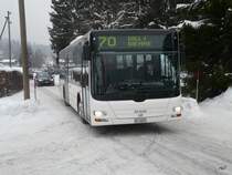 Funi Car Biel - MAN  BE 56807 unterwegs in Pres d`Orvin am 14.02.2010