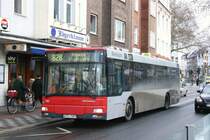 Rheinbahn 7397 (D TL 7397) mit der Linie 828 am Belsenplatz,13.2.2010. 
