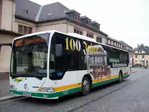 MB Citaro - MW R 50, in Glauchau Bahnhof (November 2009).
Bus wirbt f�r, die 100-Jahre-Linie (Mittweida-Burgst�dt-Limbach-Oberfrohna) im Jahre 2008