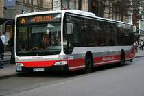 Der HHA Schnellbus 6933 vom Typ Citaro(Facelift) am 15.April 2010 auf der Linie 34 nach Lufthansa Basis in der Mnckebergstr.
