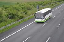 Ein Neoplan von  Autobus Sachsen , am 13.05.2010 auf der A2 bei Lehrte